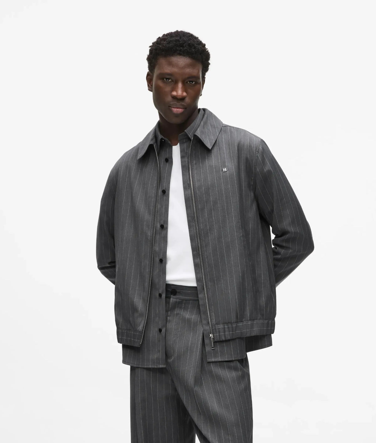 Pinstripe wool‑blend jacket