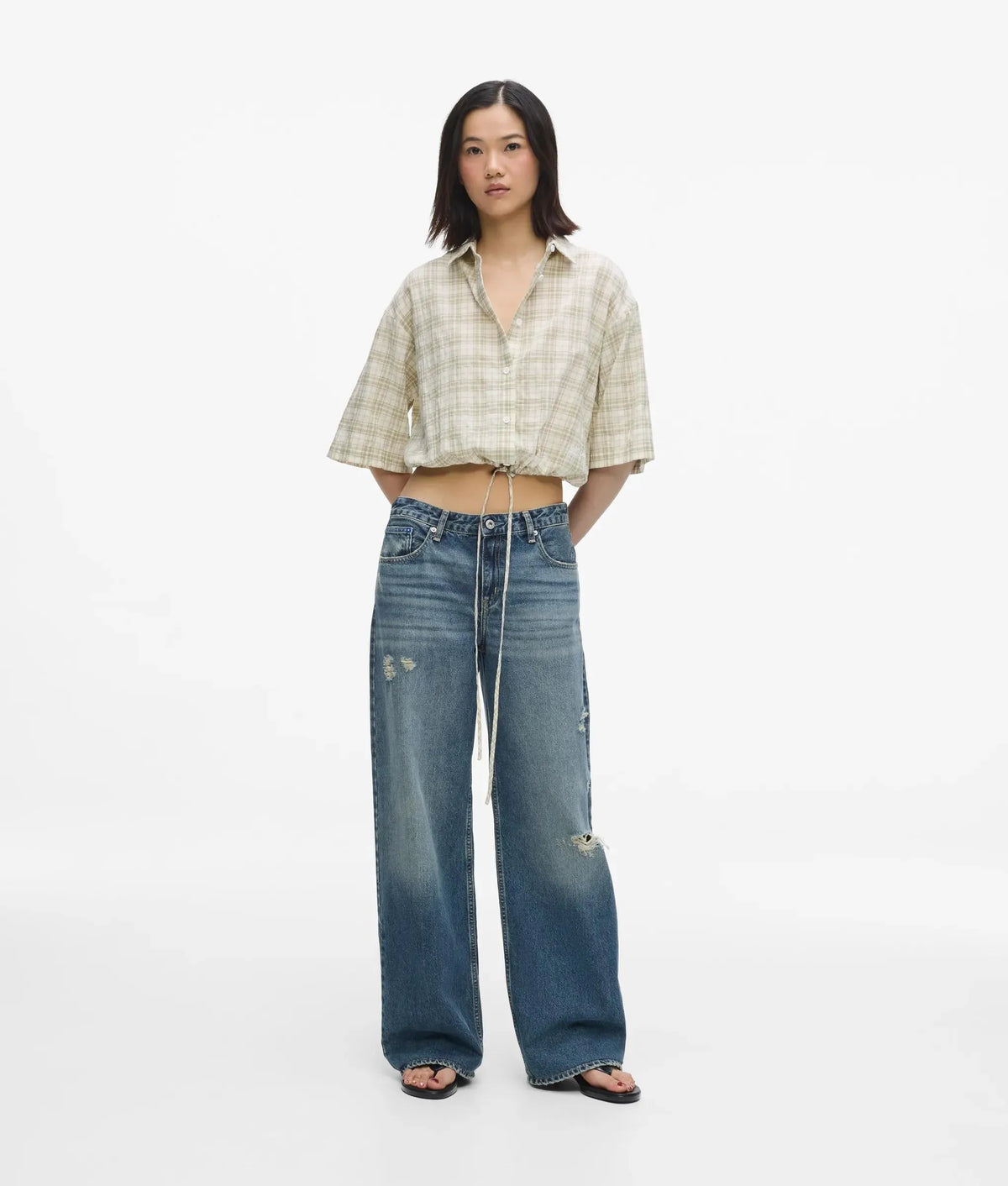 Distressed mid-rise relaxed jeans