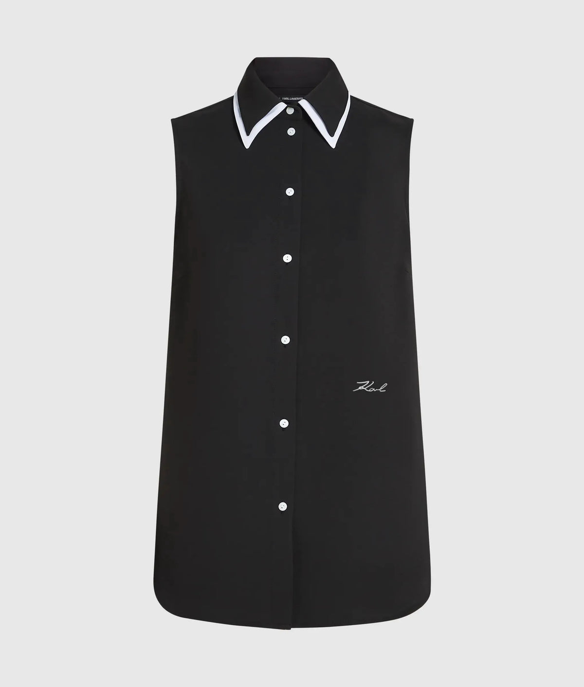 Black and white sleeveless blouse