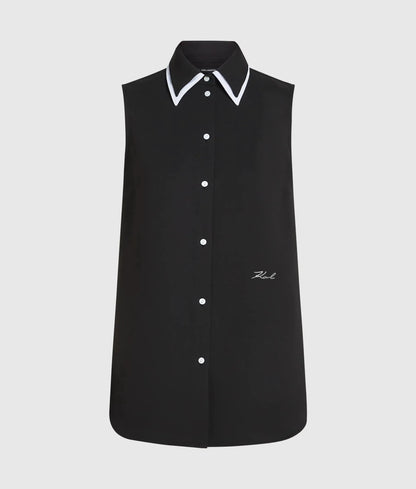 Black and white sleeveless blouse