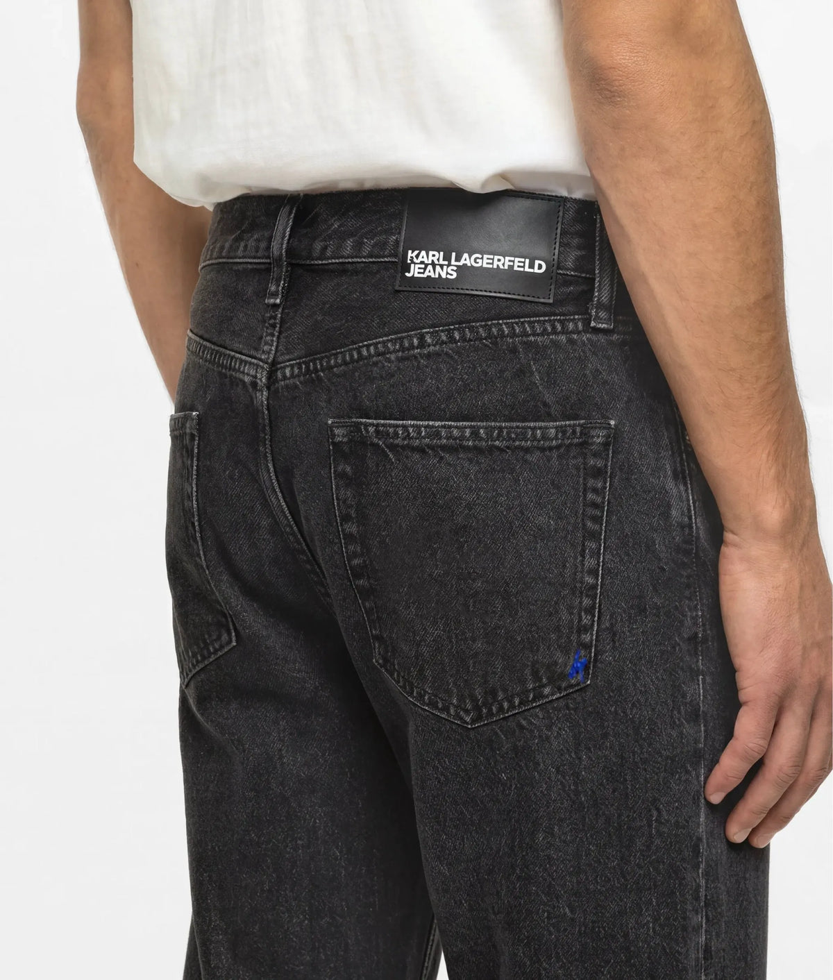 Washed black tapered jeans