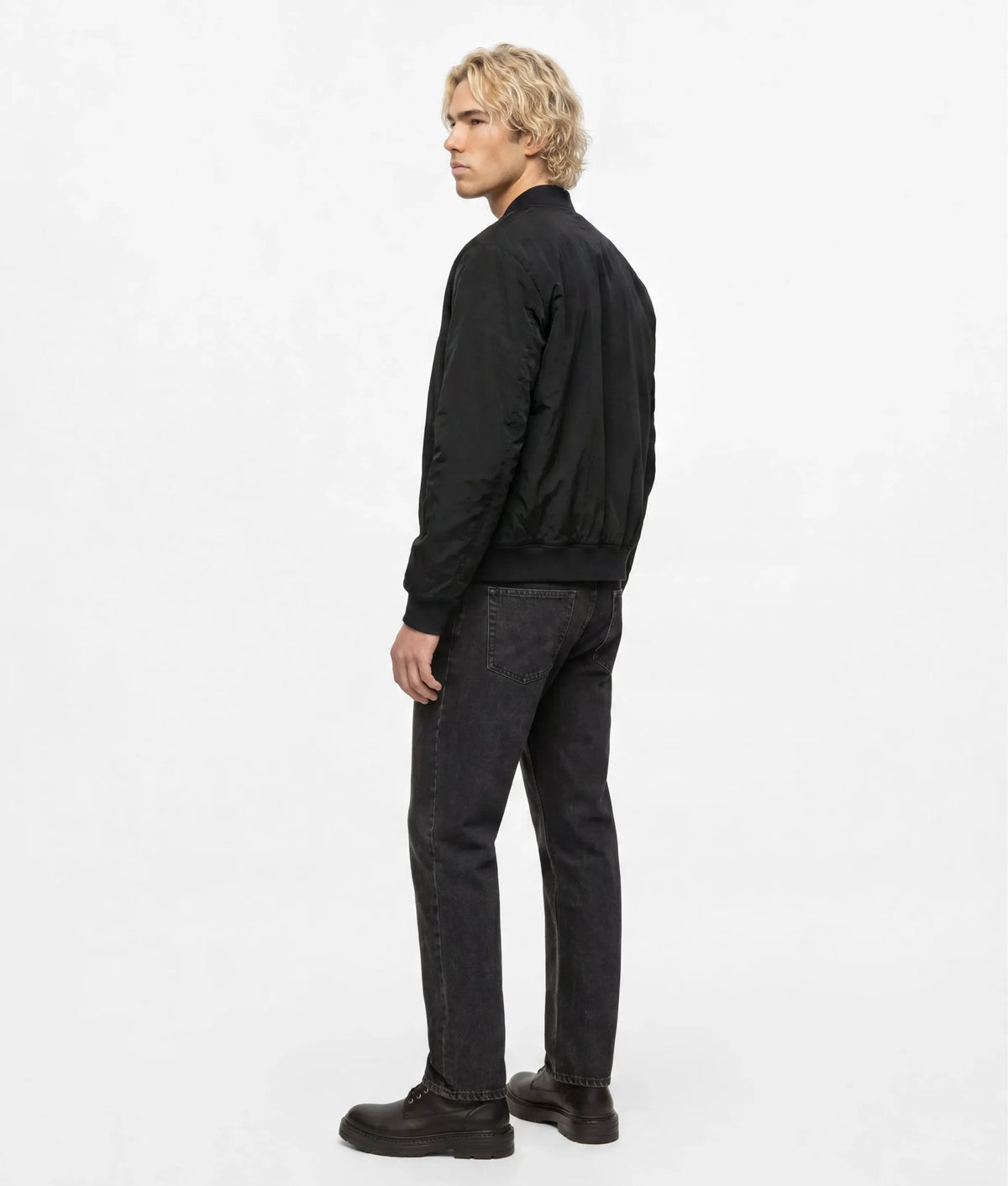 Washed black tapered jeans