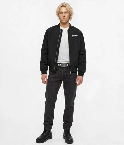 Washed black tapered jeans